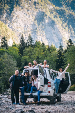 MOSCOW, RUSSIA - OCTOBER 25, 2020:Â Offroad group of tourist in jeep taking photos on a mountains background.のeditorial素材