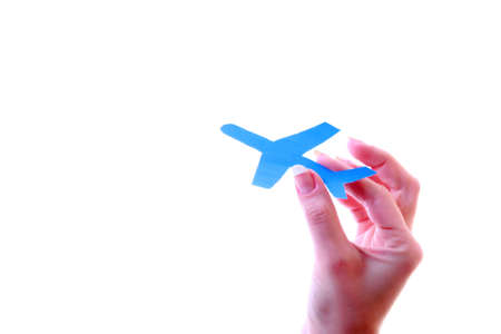 Hand launching paper airplaneの写真素材