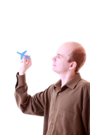 Photo of businessman holding paper aircraftの写真素材