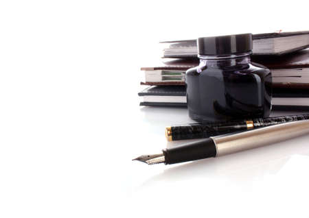 Ink and pen on whiteの写真素材