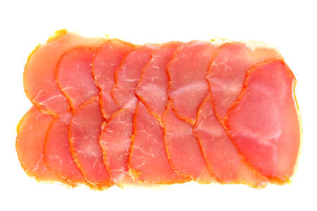 Slices of bacon on white backgroundの写真素材