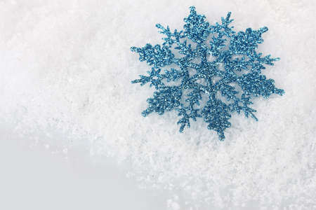 beautiful snowflake in the snow closeupの写真素材