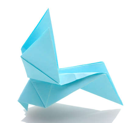 Origami pigeon out of the blue paper isolated on whiteの写真素材