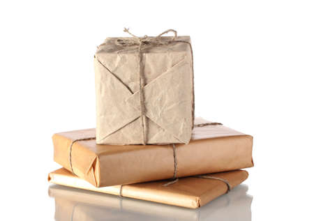 Three parcels arranged in stack isolated on whiteの写真素材