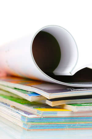 stack of magazines isolated on whiteの写真素材