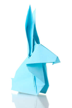Origami rabbit  out of the blue paper isolated on whiteの写真素材