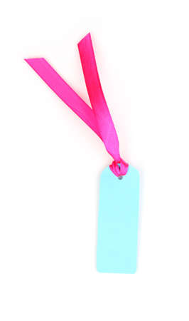 Blank label with ribbon isolated on whiteの写真素材
