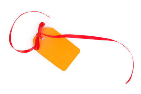 Blank label with ribbon isolated on whiteの写真素材