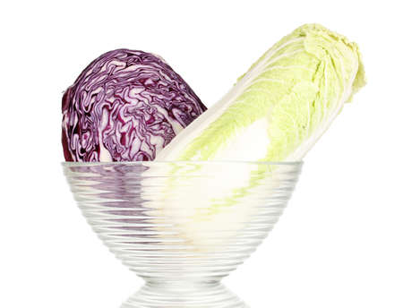 Glass bowl with cabbages isolated on whiteの写真素材