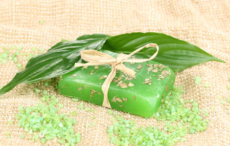 Hand-made herbal soap on sackclothの写真素材