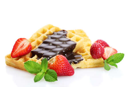 belgium waffles with strawberries and mint  isolated on whiteの写真素材