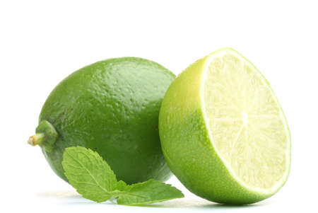 Fresh lime with mint isolated on whiteの写真素材