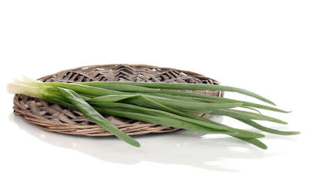 Green onion isolated on whiteの写真素材