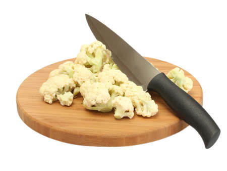 Fresh cauliflower and knife on cutting board isolated on whiteの写真素材