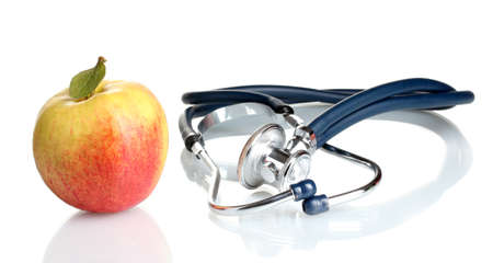 Medical stethoscope and apple isolated on whiteのeditorial素材