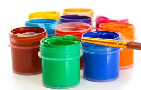 jars with multicolored gouache on white background close-upの写真素材