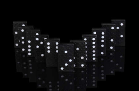 Dominoes isolated on blackの写真素材
