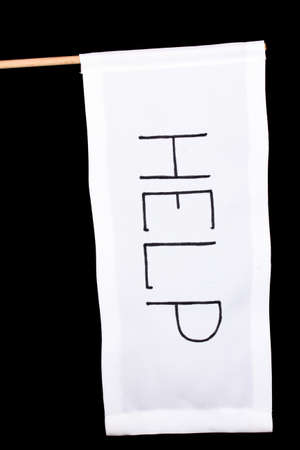 Help written on white cloth isolated on blackの写真素材