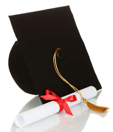 Grad hat and diploma isolated on whiteの写真素材