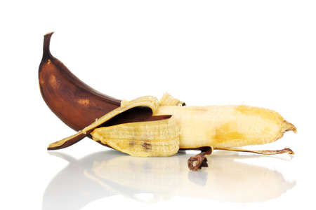 spoiled banana isolated on whiteの写真素材