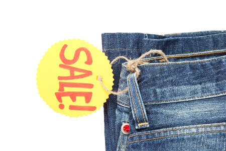 Fashion blue jeans on sale close-up isolated on whiteの写真素材