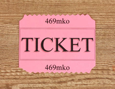 Colorful ticket on wooden background close-upの写真素材