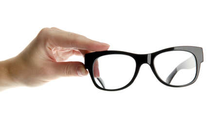 woman hand with black glasses, isolated on whiteの写真素材