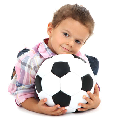 beautiful little girl with ball isolated on whiteの写真素材