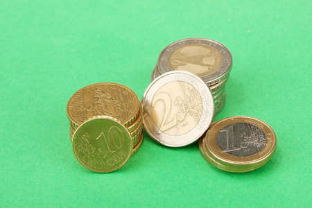 euro coins on color backgroundの写真素材