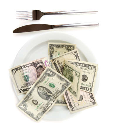 Money on plate isolated on white background close-upの写真素材