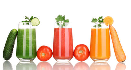 Fresh vegetable juices isolated on whiteの写真素材