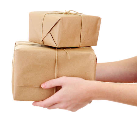 parcels boxes in woman hands, isolated on white parcels boxes in woman hands, isolated on white