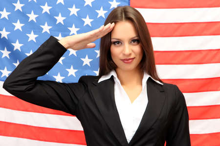 Young woman with American flagの写真素材