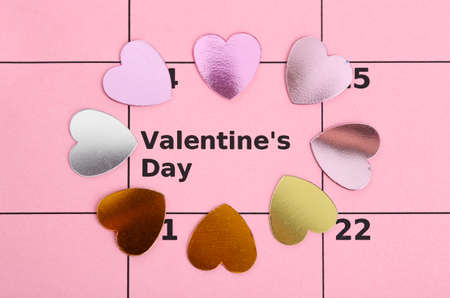 Notes on the calendar (valentines day) and rose, close-upの写真素材