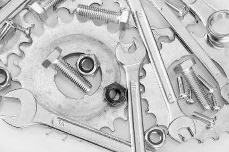 Machine gear, metal cogwheels, nuts and bolts background, close-upの写真素材