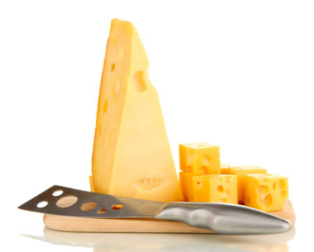 Cut cheese with knife on board isolated on whiteの写真素材