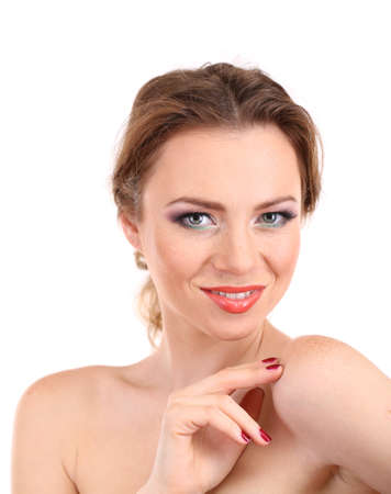 Beautiful young woman with bright make-up isolated on whiteの写真素材