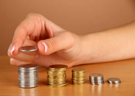 Woman hand with coins, close upの写真素材
