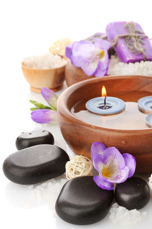 Beautiful spa setting with flowers, isolated on whiteの写真素材