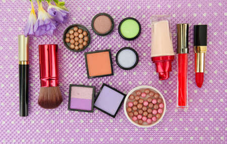 Decorative cosmetics on purple backgroundの写真素材