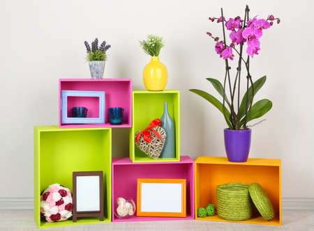 Beautiful colorful shelves with different home related objectsの写真素材