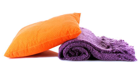 Warm plaid and color pillow, isolated on whiteの写真素材