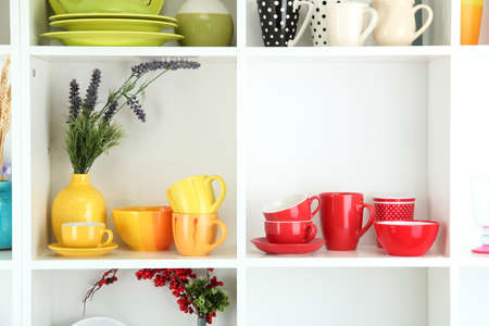 Beautiful white shelves with tableware and decor
の写真素材