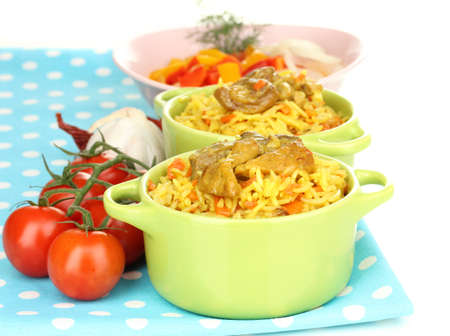 Delicious pilaf with vegetables isolated on whiteの写真素材