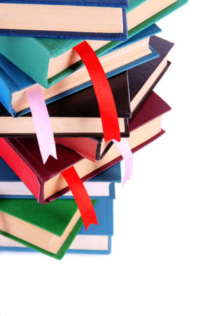 Many books with bookmarks isolated on whiteの写真素材