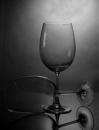 Empty wine glasses arranged on grey backgroundの写真素材
