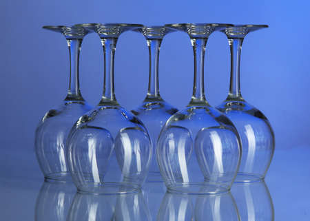 Glasses on blue backgroundの写真素材