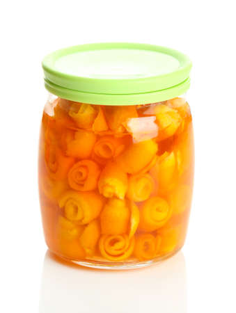 Orange jam with zest, isolated on whiteの写真素材