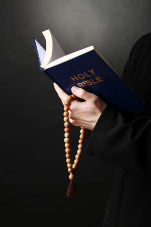 Priest reading from the holy bible, close upの写真素材