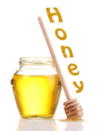 Jar of honey isolated on whiteの写真素材